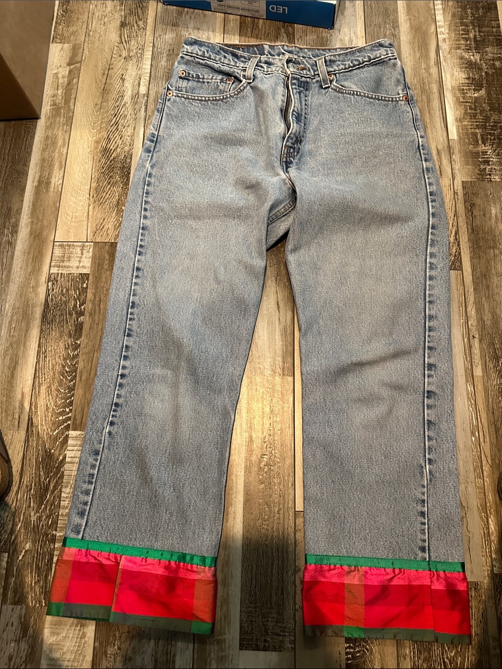 Light Blue Wide-Leg Jeans with Red & Green Hem Accent
